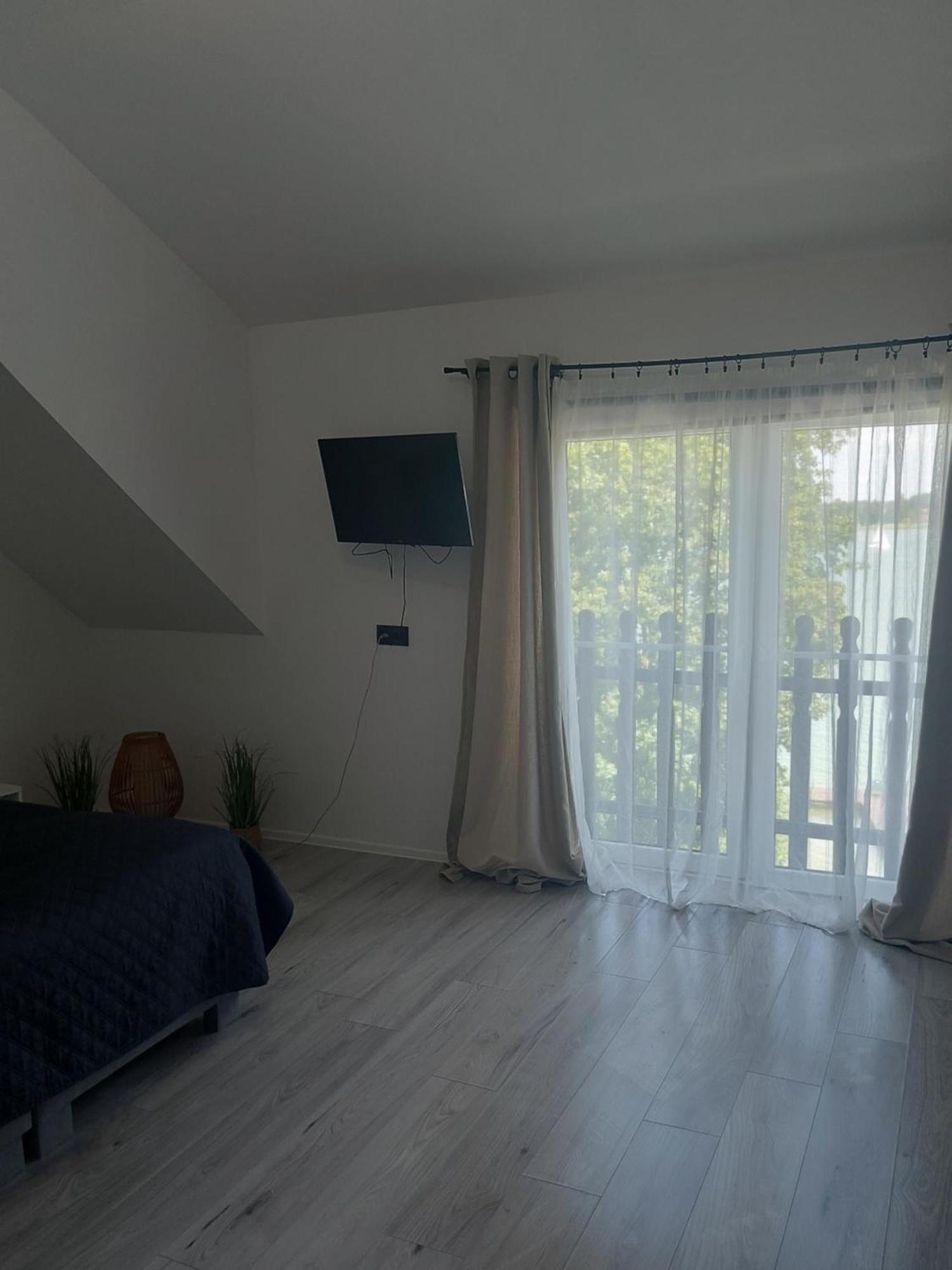 Pokoje I Apartamenty Matdar Mikołajki Oda fotoğraf